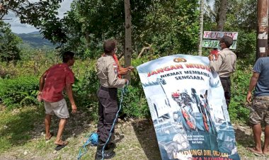 Pasang-Imbauan-Tidak-Mudik,-Salah-Satu-Upaya-Polsek-Lamaknen-Minimalisir-Penularan-Covid-19