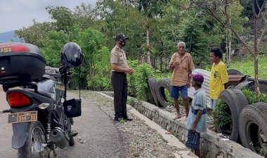 Cegah-Penularan-Covid-19,-Bhabinkamtibmas-Umanen-Minta-Warga-RT.21-Taati-Protokol-Kesehatan