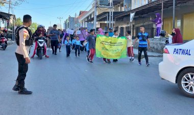 Jamin-Situasi-Kondusif,-Polres-Belu-Kawal-dan-Amankan-Jalan-Santai-Peringati-Tahun-Baru-Islam-1-Muharram-1445-H