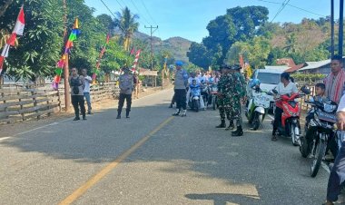 Dari-Stasi-Silawan-menuju-Stasi-Seroja,-Polsek-Tastim-Bersama-Satgas-Pamtas-dan-Pos-Pam-Motaain-Amankan-Prosesi-Naifeto-Lalean