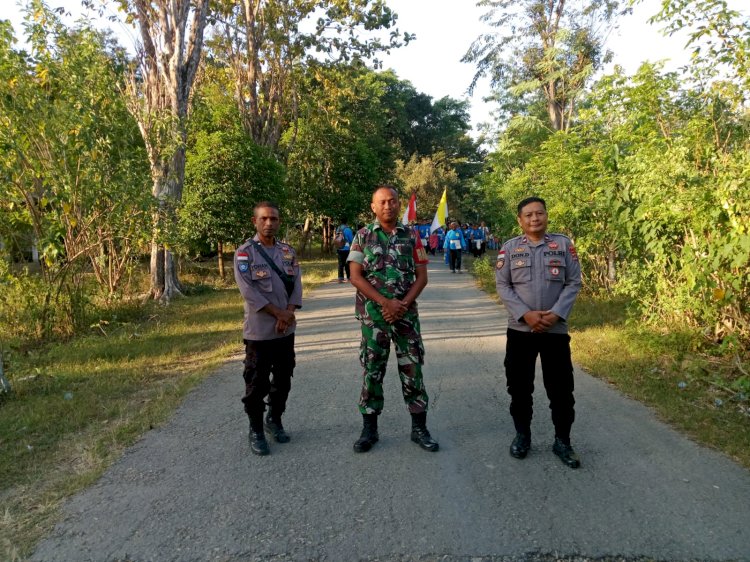 Bergerak dari Desa Manleten ke Desa Takirin , Polsek Tasifeto Timur Bersama Koramil Wedomu Amankan Perarakan Patung Yesus Kerahiman Ilahi